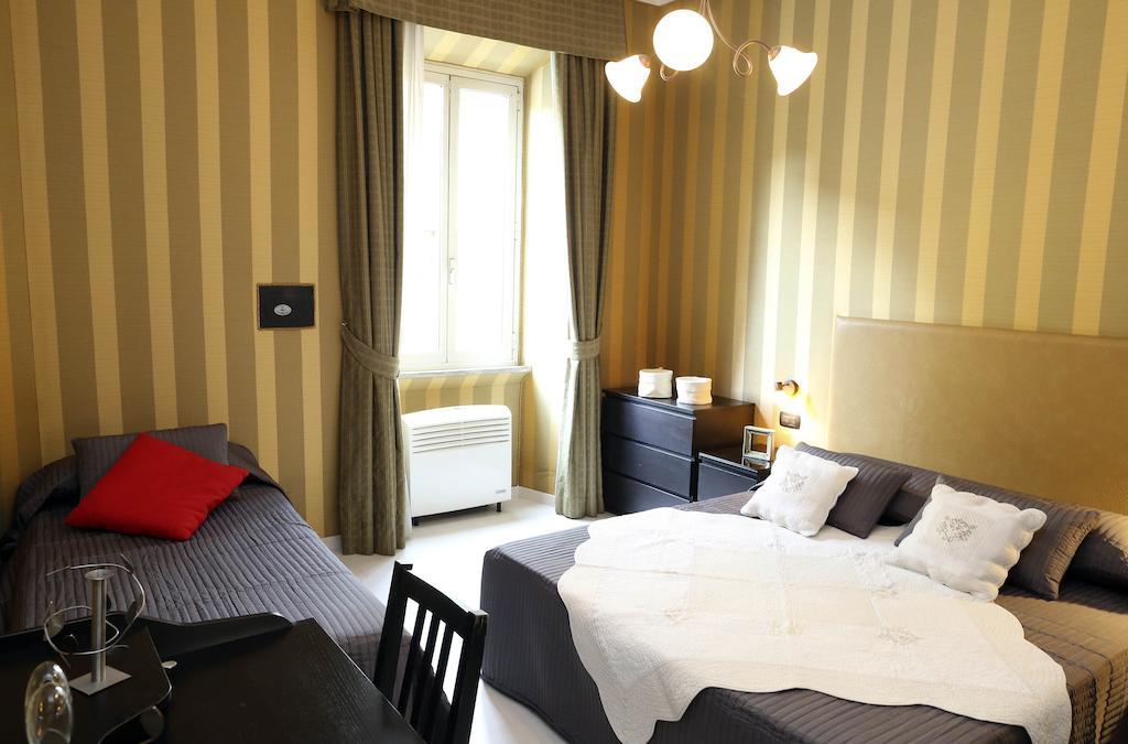 Caracciolo Guest House Roma Camera foto